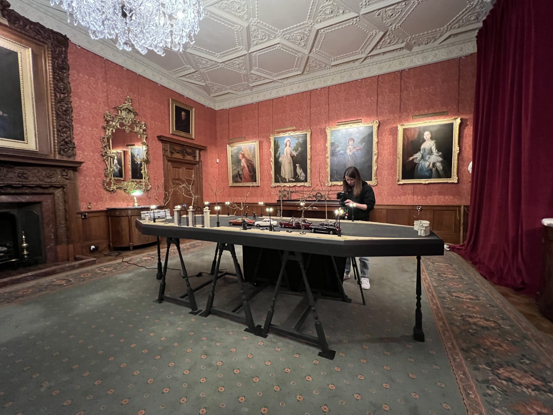 Team members from Visualskies conducting photogrammetry capture of the physical model at Shuttleworth House, using specialised equipment to document the scene.