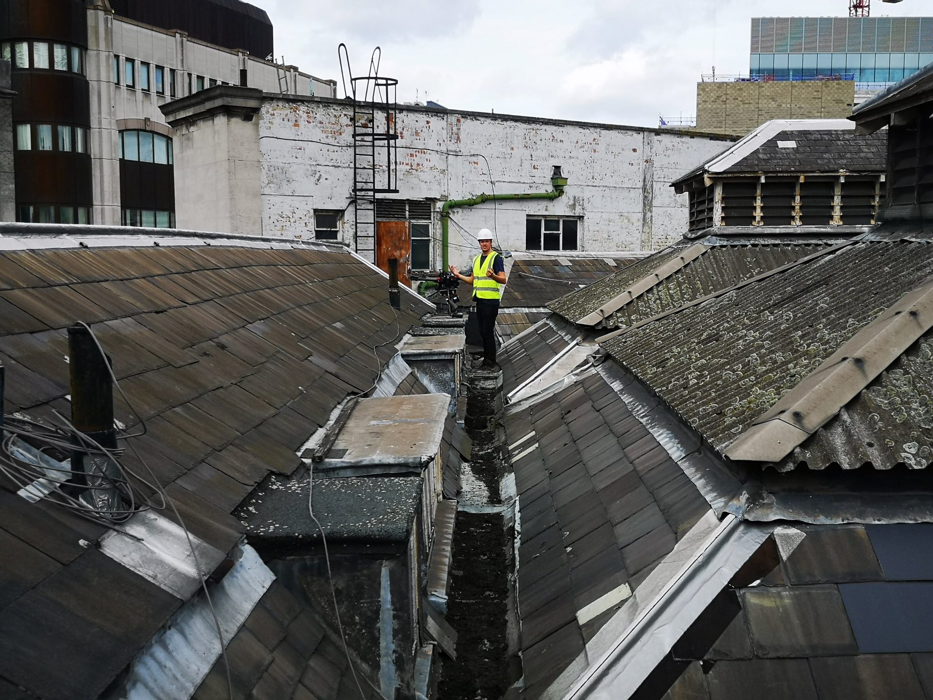 Surveyor on the roof of the General Market, West Smithfield, during a LiDAR survey